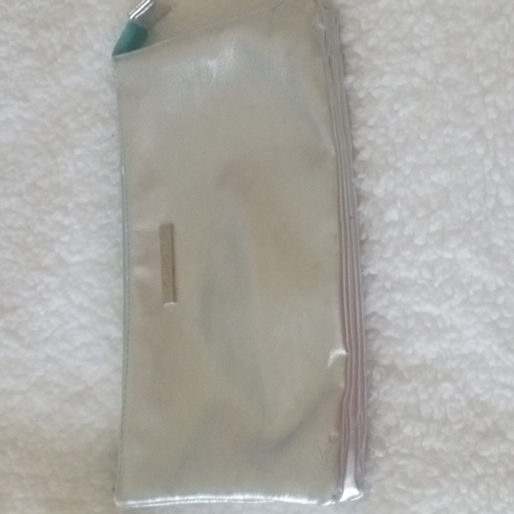Clinique silver faux leather cosmetic makeup bag